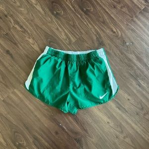 Green Nike shorts